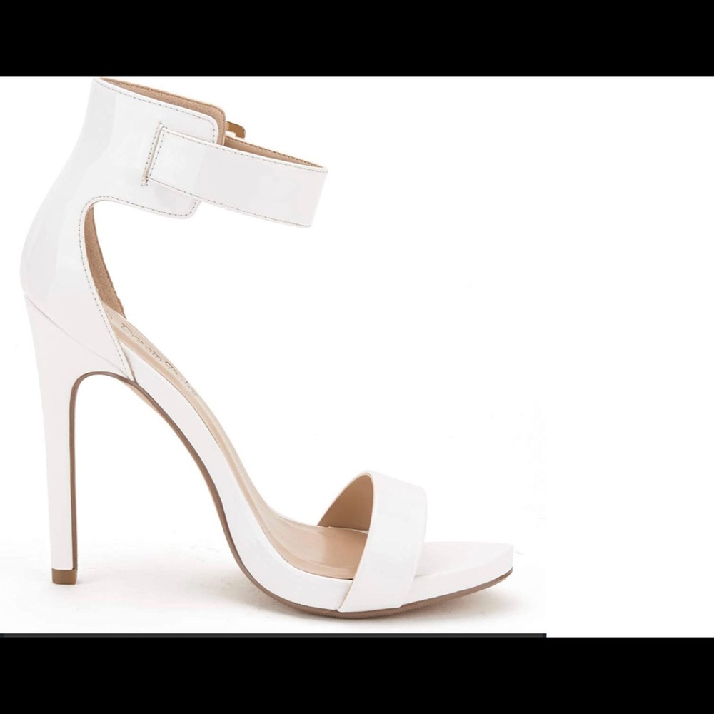 Sexsy Dream Pairs white painted heels.